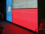 A giant neon Texas flag